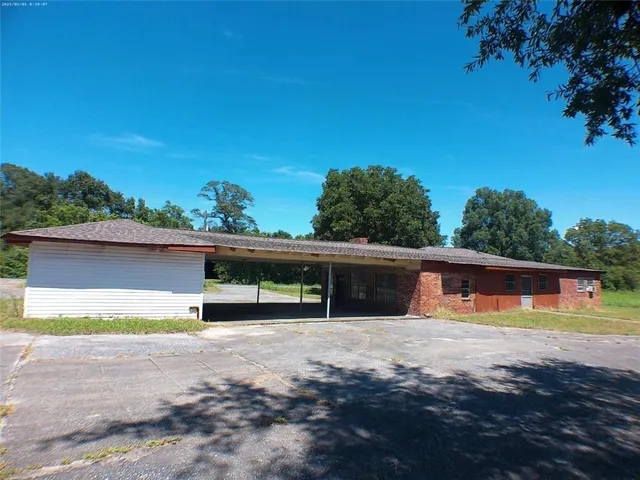 a view of swimming pool with a yard