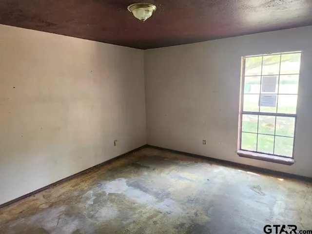 an empty room with a window