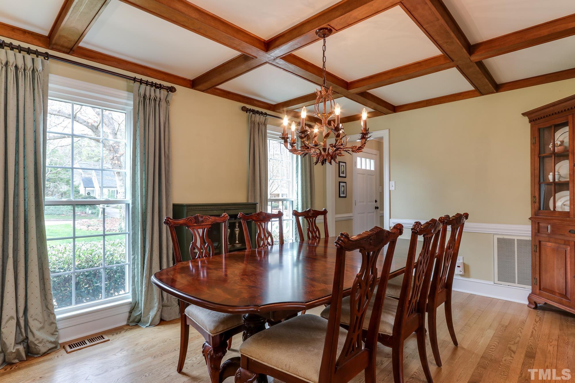 8920 Lindenshire Road Raleigh, NC 27615 - Photo 5 of 26 a view of a dining room with furniture window and wooden floor