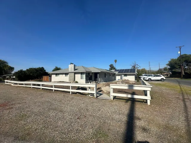 a view of a terrace with chairs