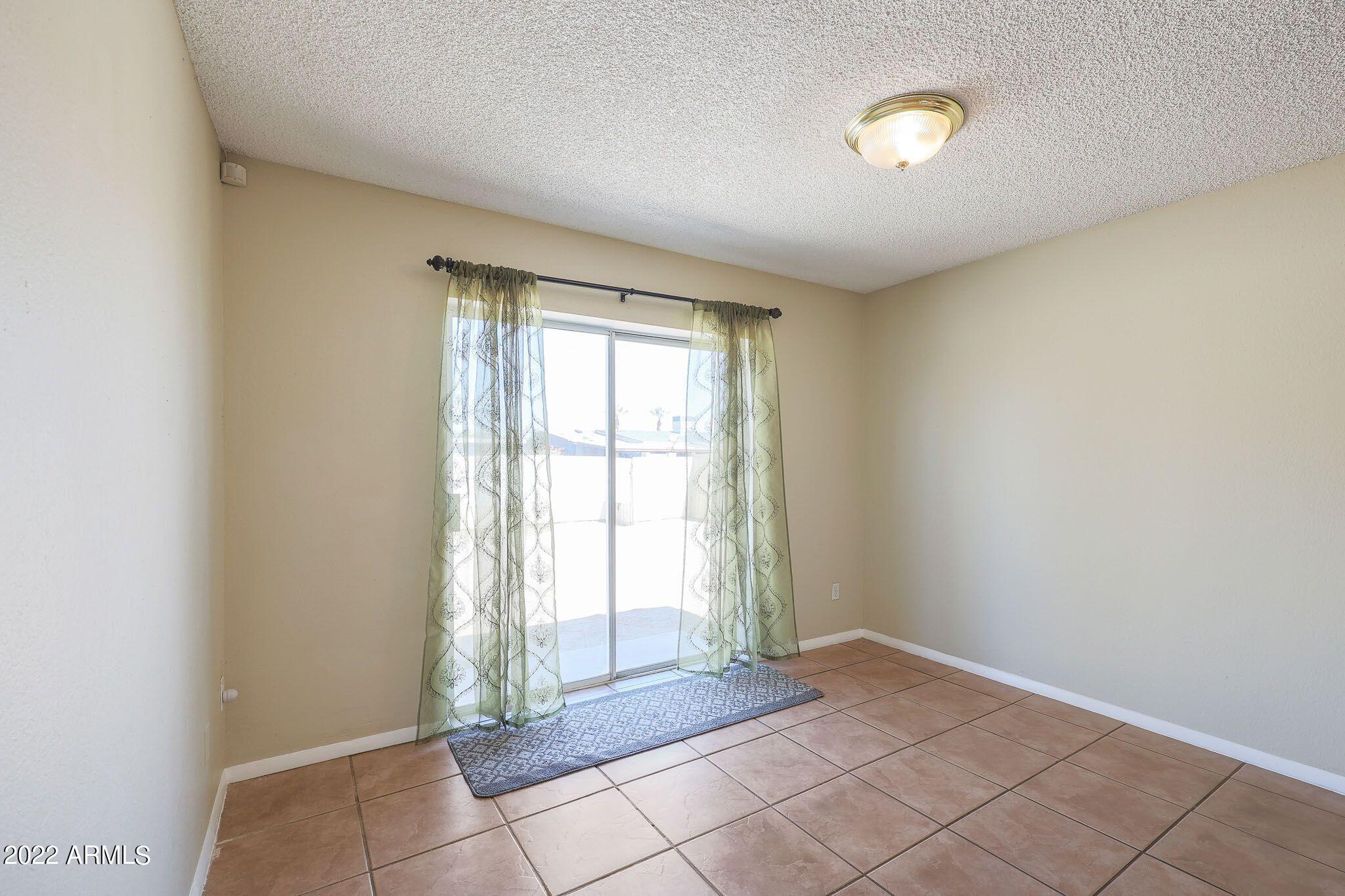 1602 West Carson Road Phoenix, AZ 85041 - Photo 6 of 19 DINNING AREA