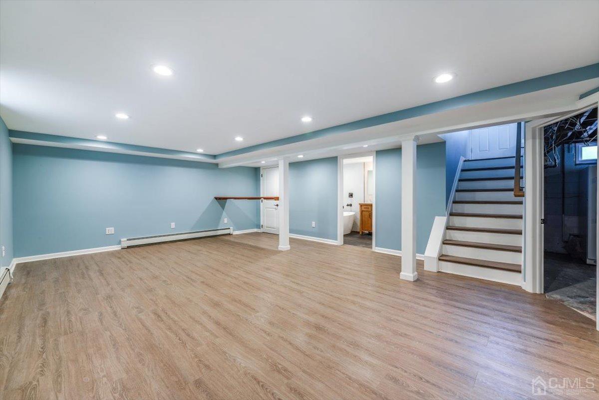 364 New Market Road Dunellen, NJ 08812 - Photo 3 of 36 a view of empty room with wooden floor