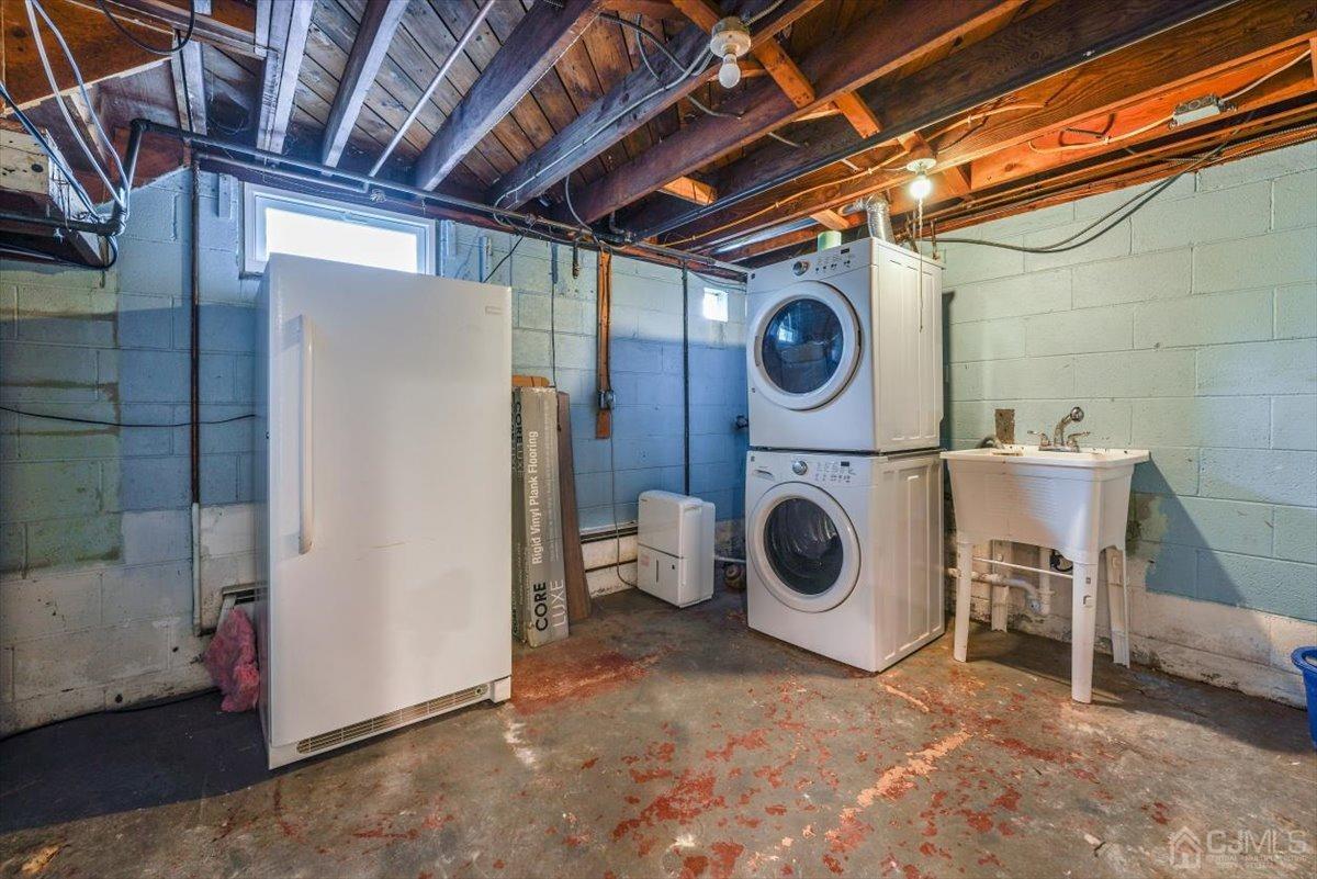 364 New Market Road Dunellen, NJ 08812 - Photo 10 of 36 a utility room with dryer and washer