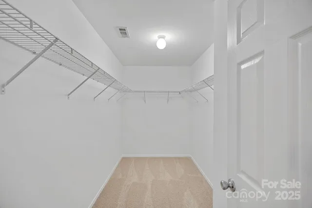 a view of a room with racks on the wall