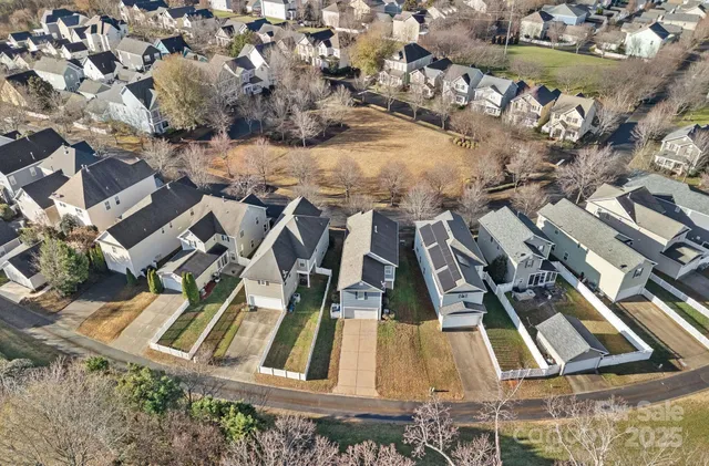 an aerial view of residential house with outdoor space