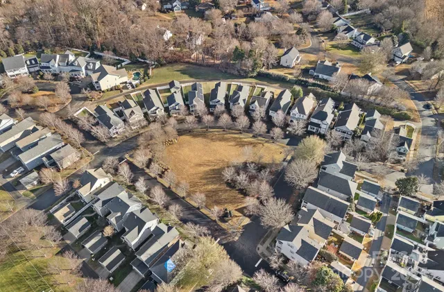 a view of a swimming pool and an outdoor space