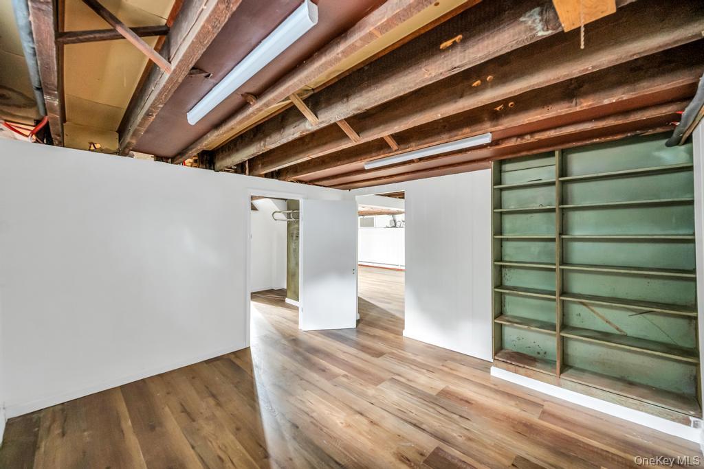 15 Superior Road Bellerose Village, NY 11001 - Photo 16 of 29 Basement with wood finished floors