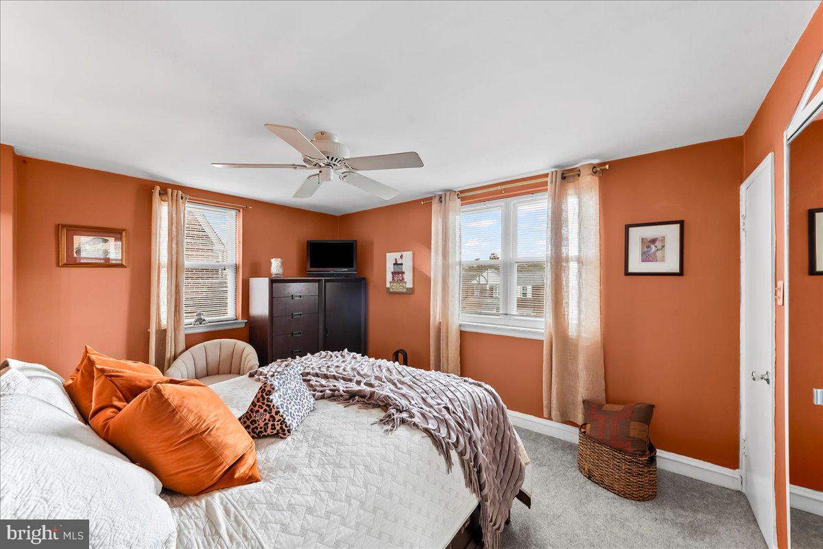 8309 Lynnewood Road Philadelphia, PA 19150 - Photo 12 of 28 a bed sitting in a bedroom next to a window