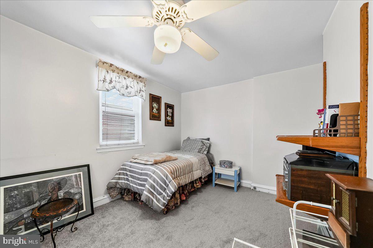 8309 Lynnewood Road Philadelphia, PA 19150 - Photo 19 of 28 a bedroom with a bed and a window