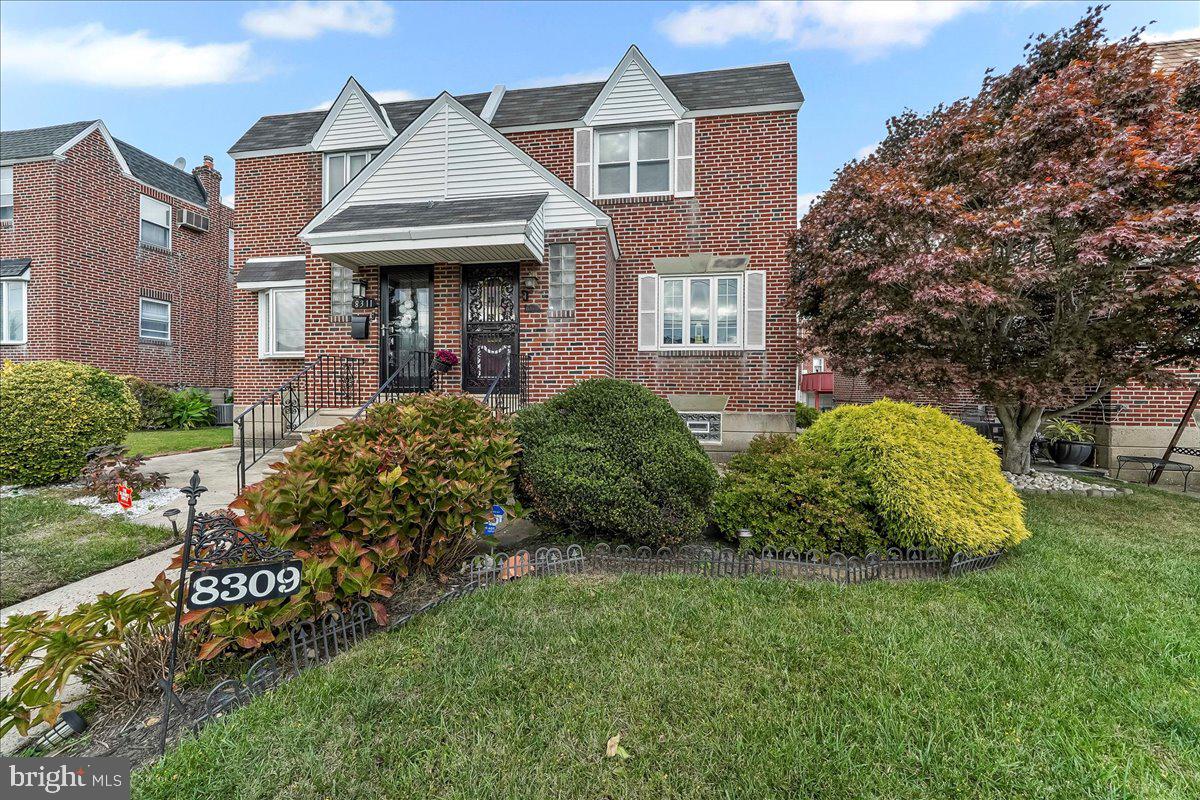 8309 Lynnewood Road Philadelphia, PA 19150 - Photo 28 of 28 a view of a house with a garden
