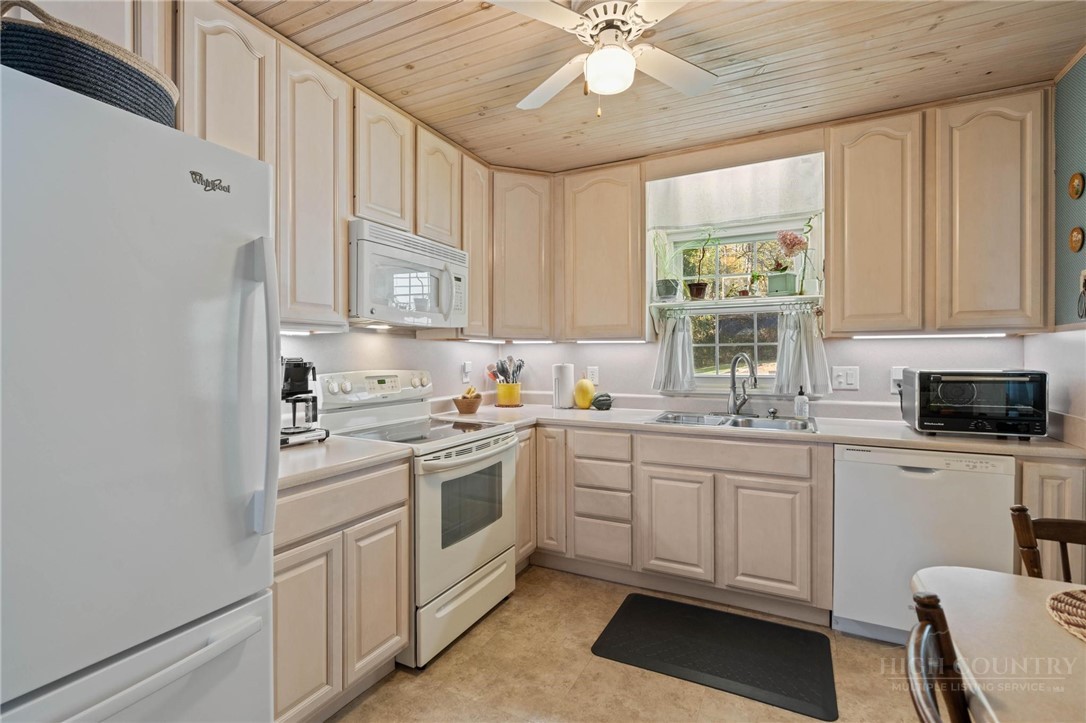 112 Chandy Street Boone, NC 28607 - Photo 14 of 50 a kitchen with a sink cabinets and window
