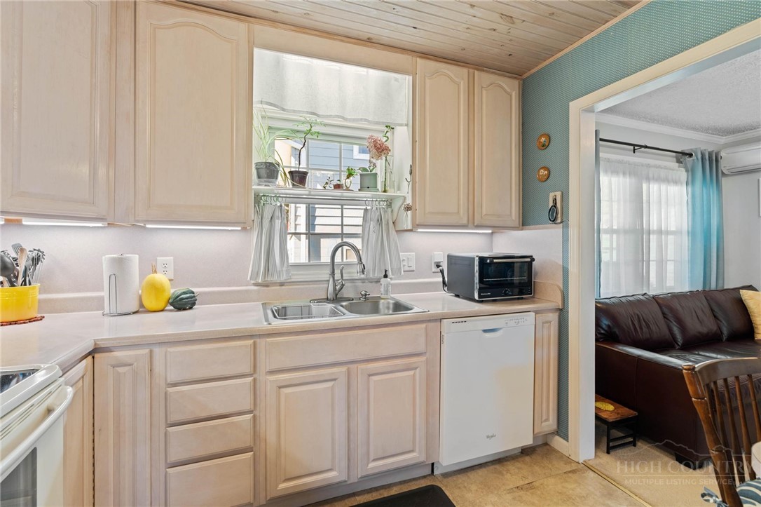 112 Chandy Street Boone, NC 28607 - Photo 15 of 50 a kitchen with a sink and cabinets