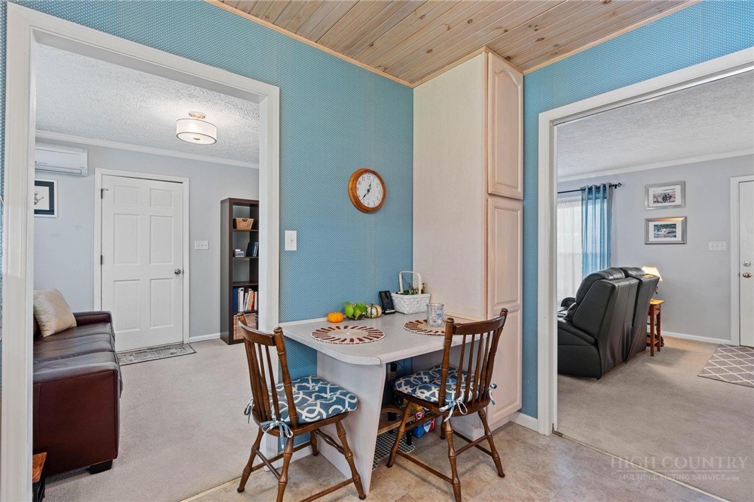 112 Chandy Street Boone, NC 28607 - Photo 17 of 50 a view of a dining room with furniture and a table