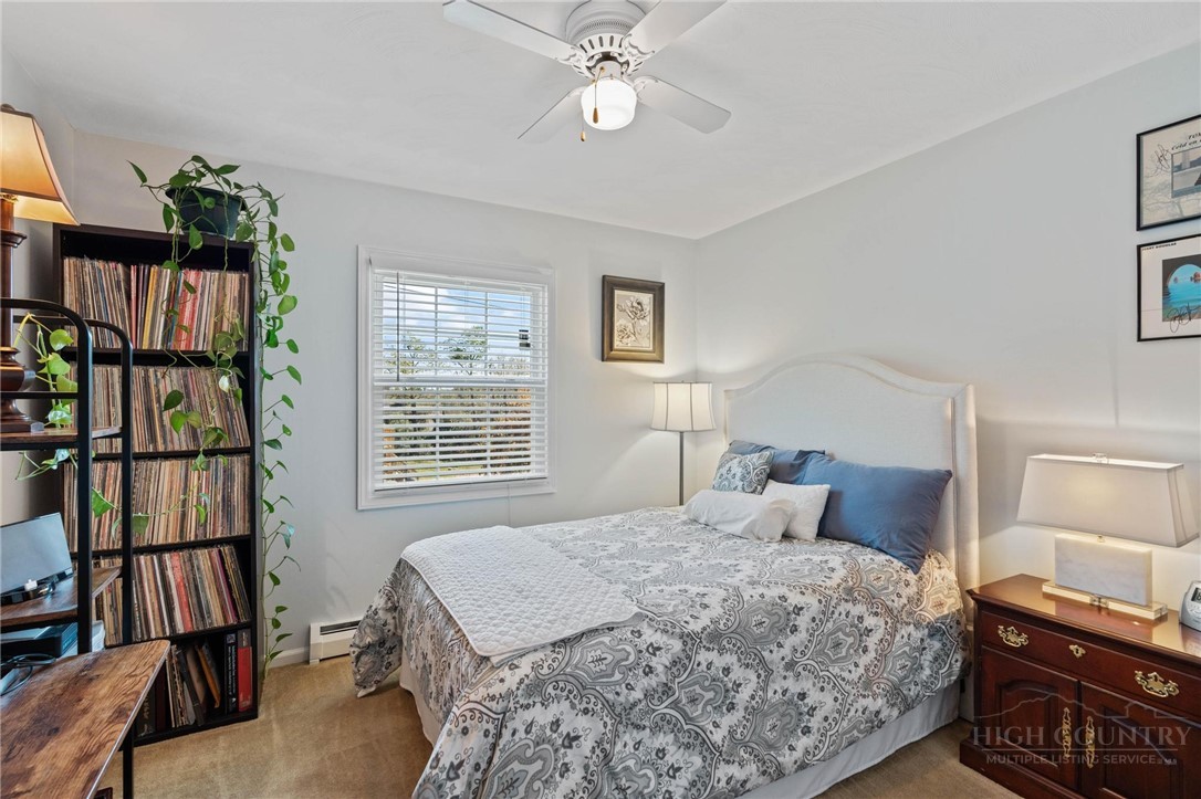 112 Chandy Street Boone, NC 28607 - Photo 21 of 50 a bedroom with a bed furniture and a window