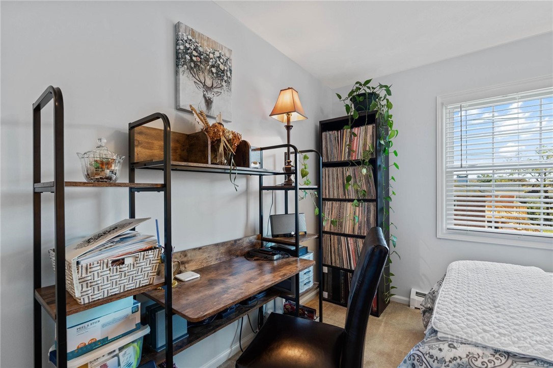 112 Chandy Street Boone, NC 28607 - Photo 22 of 50 a bedroom with furniture and a window