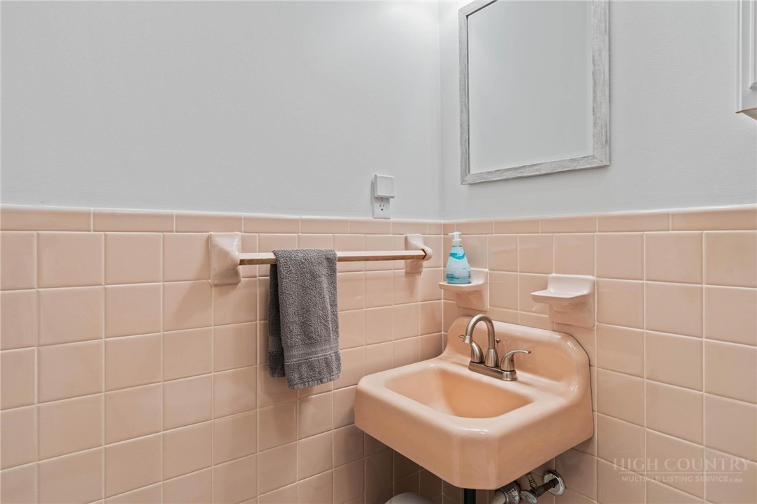 112 Chandy Street Boone, NC 28607 - Photo 24 of 50 a bathroom with a sink and a mirror