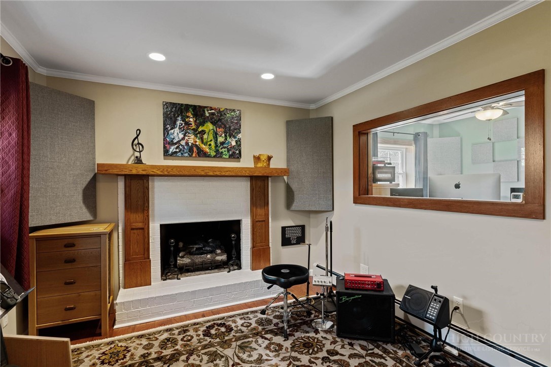 112 Chandy Street Boone, NC 28607 - Photo 29 of 50 a living room with furniture and a fireplace
