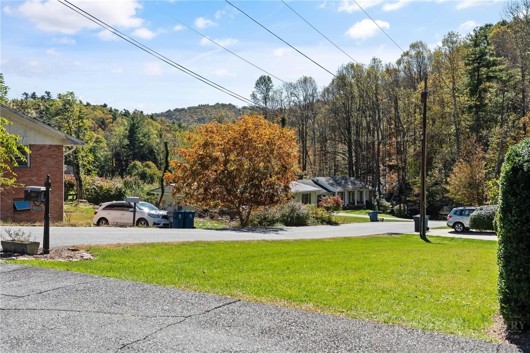 112 Chandy Street Boone, NC 28607 - Photo 38 of 50 a view of a playground with basketball court