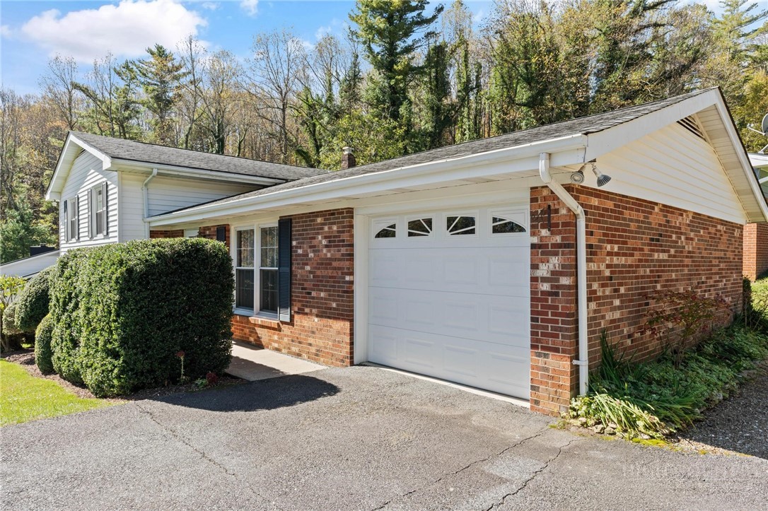 112 Chandy Street Boone, NC 28607 - Photo 41 of 50 a view of a house with a yard