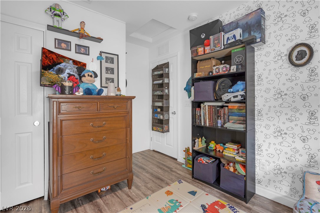4536 Woolcomber Street Las Vegas, NV 89115 - Photo 25 of 34 Bedroom with light wood finished floors