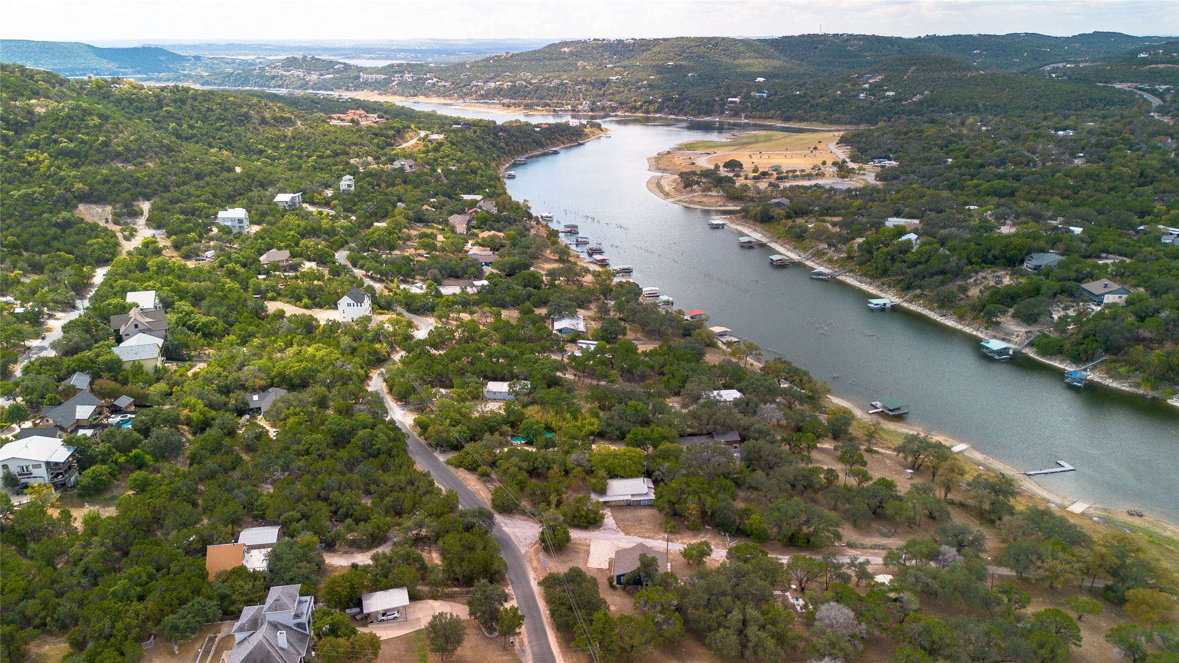 11104 Beach Road Leander, TX 78641 - Photo 18 of 21 Aerial view of property's location featuring a water and mountain view