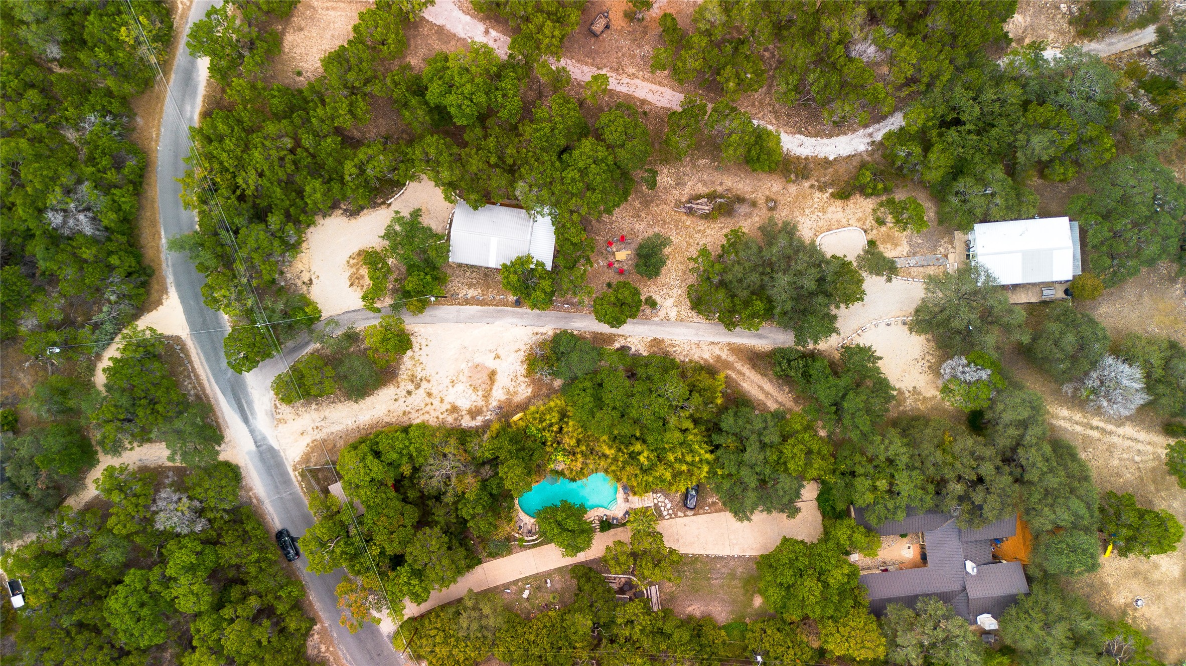 11104 Beach Road Leander, TX 78641 - Photo 21 of 21 Aerial view of property and surrounding area with a pool