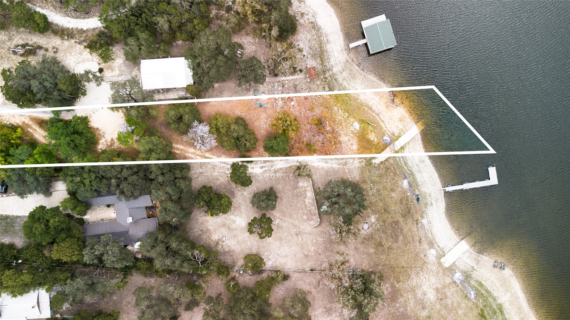 11104 Beach Road Leander, TX 78641 - Photo 5 of 21 Aerial view of property's location featuring a nearby body of water and property boundaries highlighted