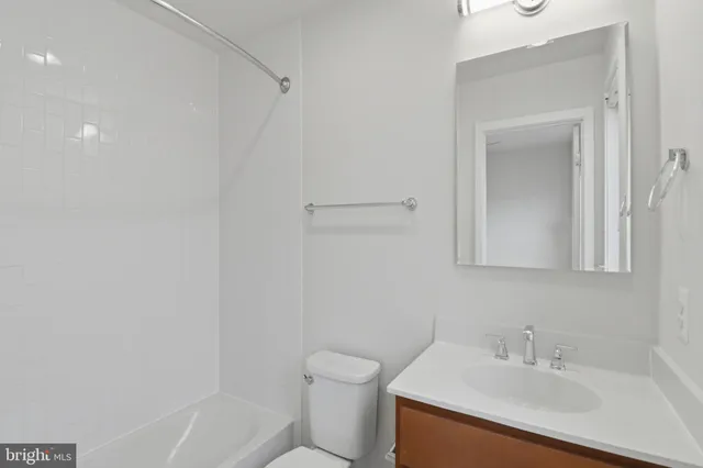 a view of a balcony with chairs