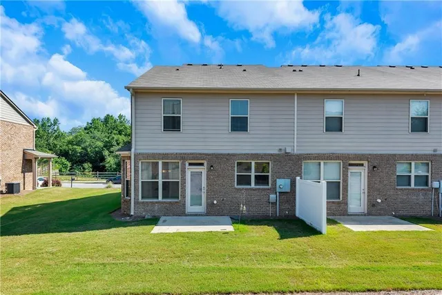 a view of a house with a swimming pool