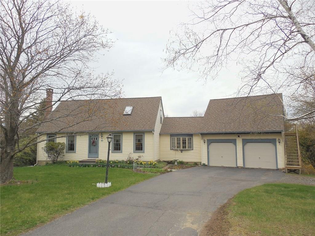 21 Crestview Road Plymouth, CT 06786 - Photo 1 of 1 a front view of a house with a garden and trees