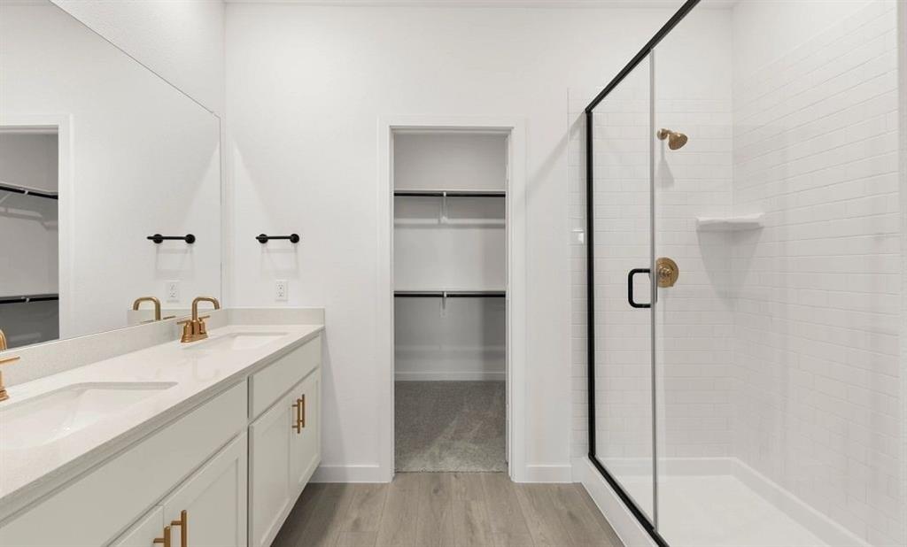 1901 Boston Way Princeton, TX 75407 - Photo 10 of 15 a bathroom with a granite countertop sink mirror and shower