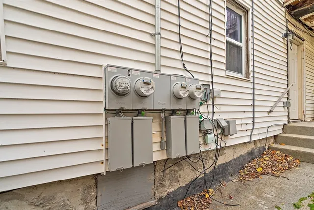 a view of a house with a small yard