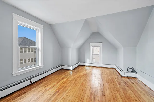 a picture of a bench in a white building