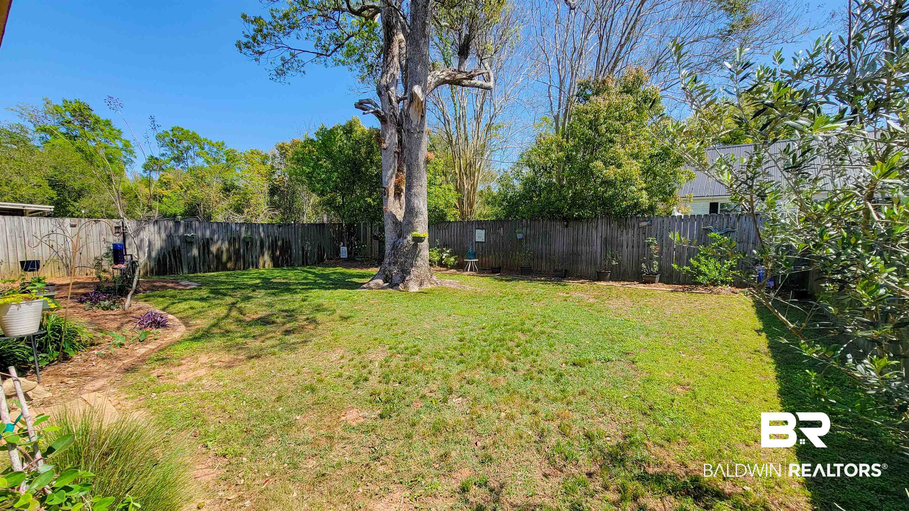 1304 Majesty Loop Foley, AL 36535 - Photo 28 of 44 View of fenced backyard