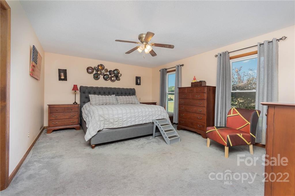 4414 Hunter Rhyne Road Lincolnton, NC 28092 - Photo 21 of 35 a bedroom with furniture and windows
