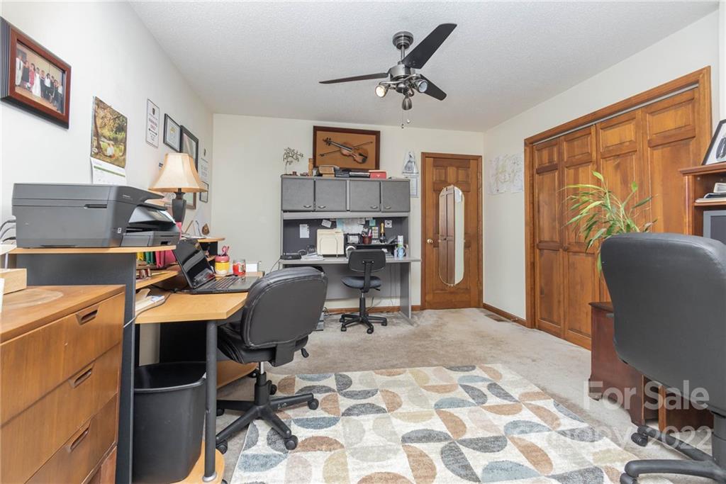 4414 Hunter Rhyne Road Lincolnton, NC 28092 - Photo 30 of 35 a view of a workspace with furniture and a window