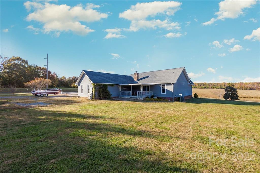 4414 Hunter Rhyne Road Lincolnton, NC 28092 - Photo 33 of 35 a balcony with table and chairs