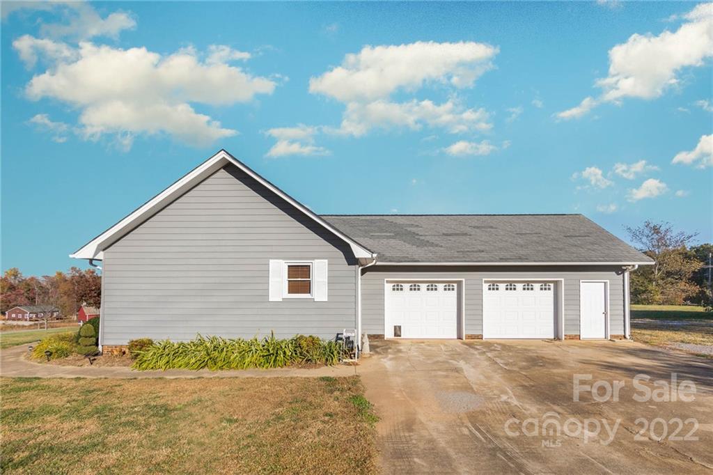 4414 Hunter Rhyne Road Lincolnton, NC 28092 - Photo 5 of 35 a view of an house with backyard