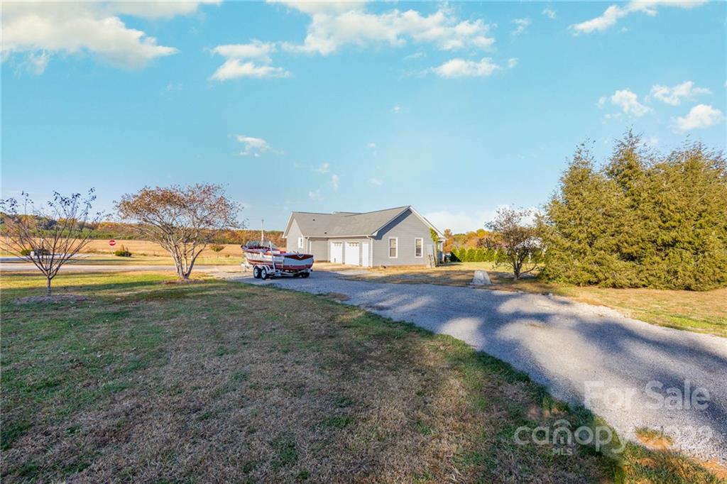 4414 Hunter Rhyne Road Lincolnton, NC 28092 - Photo 6 of 35 a view of a yard
