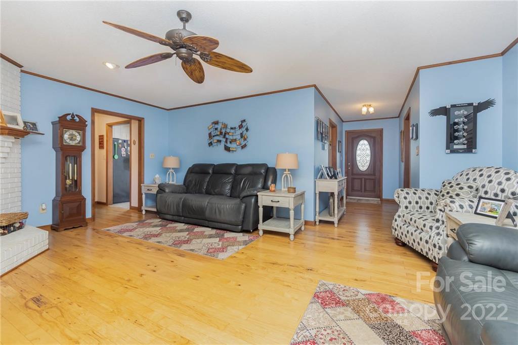 4414 Hunter Rhyne Road Lincolnton, NC 28092 - Photo 7 of 35 a living room with furniture and a rug