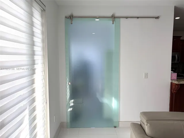 a bathroom with a sink and toilet