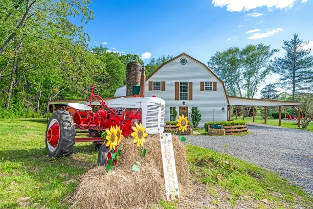 a front view of a house with patio
