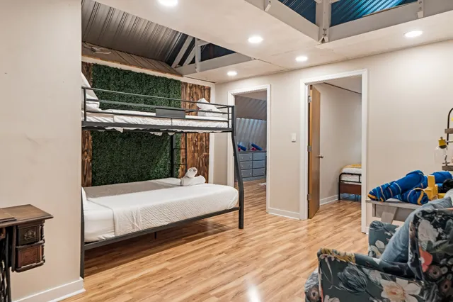 a view of a porch with furniture and a yard