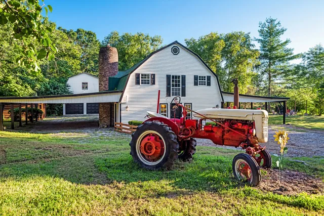 a view of swimming pool with outdoor seating