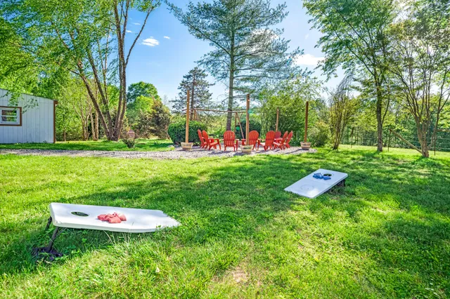 a bathroom with a sink a toilet and a bathtub
