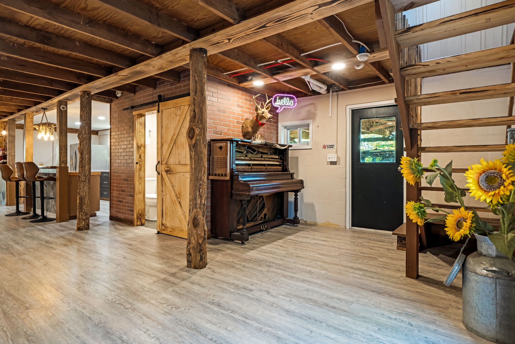 1323 Mt Zion Road Ashland City, TN 37015 - Photo 6 of 81 a view of an empty room with furniture wooden floor and windows