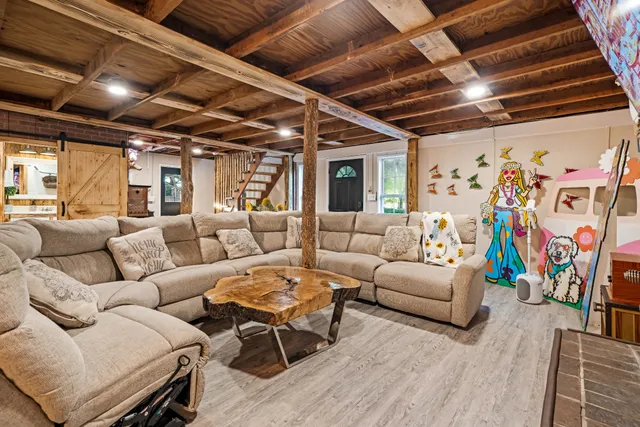a kitchen with a refrigerator and a sink