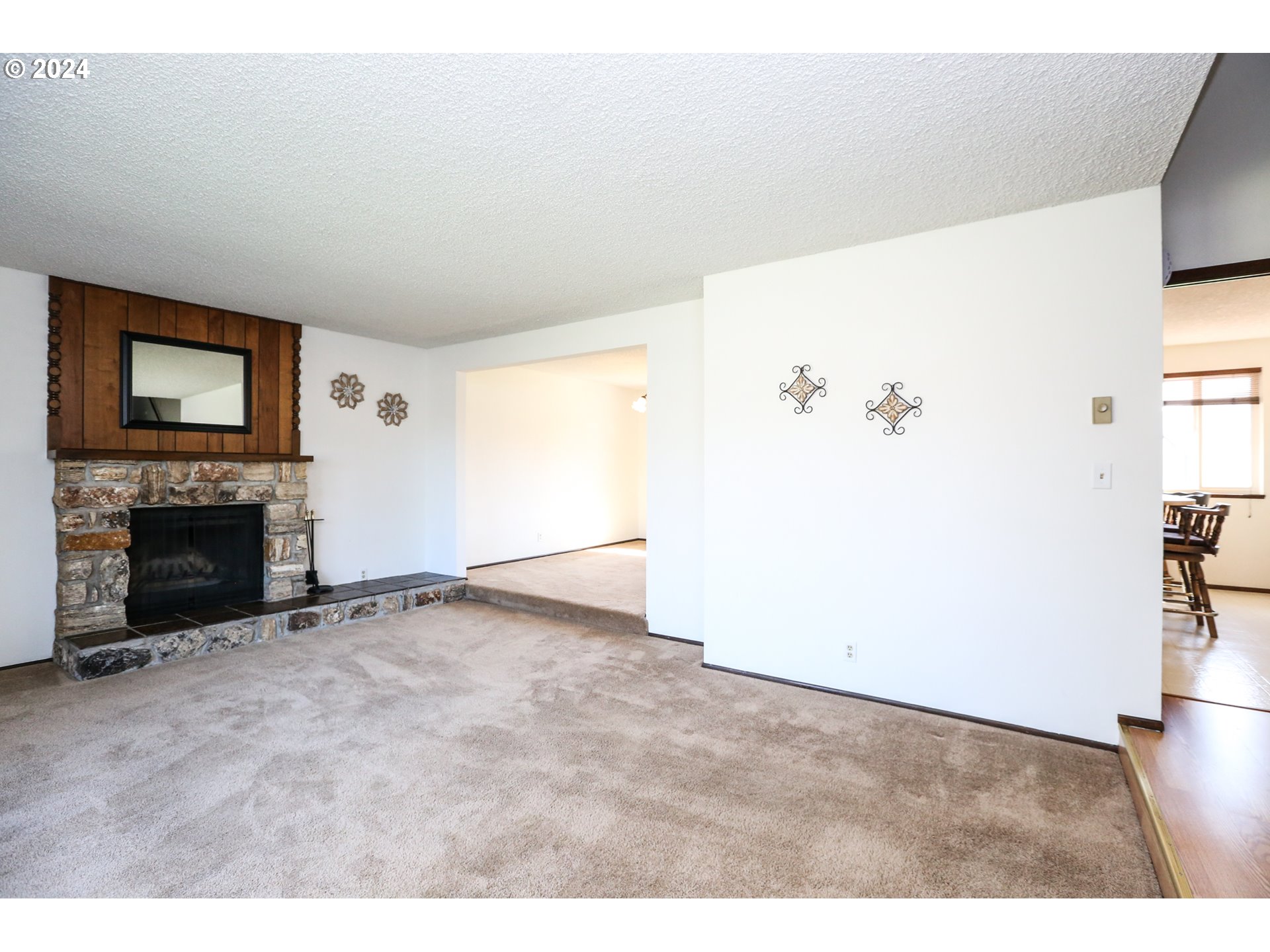 431 65th Street Springfield, OR 97478 - Photo 13 of 32 a view of an empty room with a fireplace