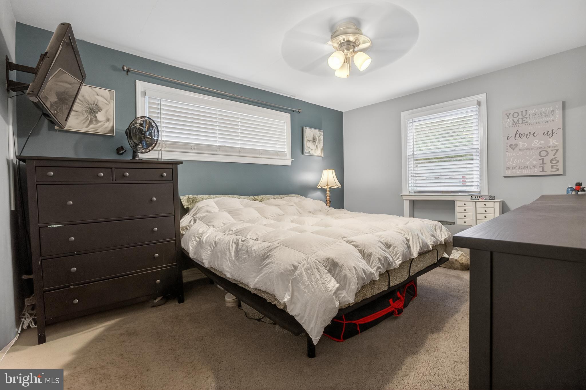 1123 Wynnbrook Road Secane, PA 19018 - Photo 6 of 14 a bedroom with a bed and window