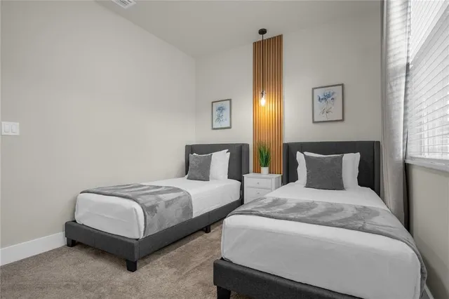 a view of a balcony with chairs